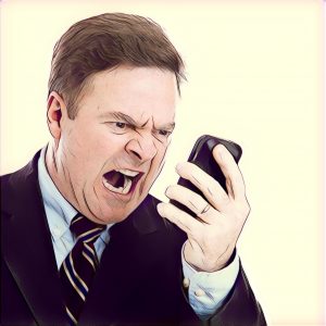 Hombre respondiendo WhatsApp lleno de ira